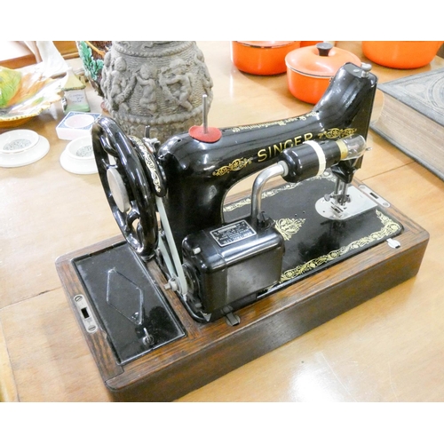 148 - Singer electric sewing machine in case