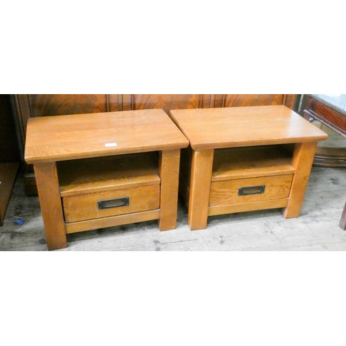 169 - A pair of heavy oak lamp or bedside tables, each fitted  with one drawer