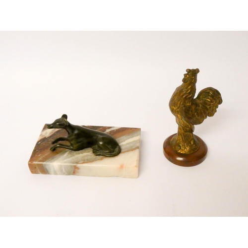 511 - A small bronze whippet on marble base and a gilded bronze cockerel