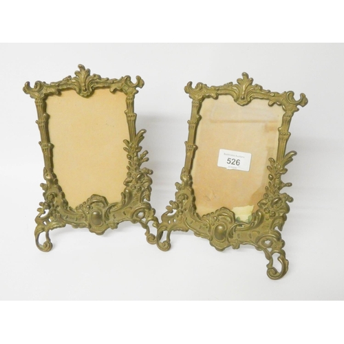 526 - A pair of decorative easel brass photo frames, each 9