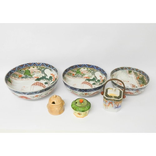 529 - Three various graduated Satsuma fruit bowls and three small honey pots