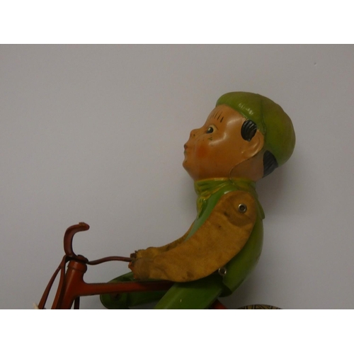 545 - A 1930's Triang tin plate toy of a racing cyclist