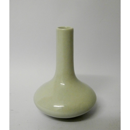 548 - A Chinese Celadon vase with dragon pattern with clouds, 5