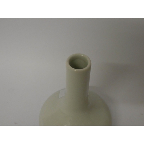 548 - A Chinese Celadon vase with dragon pattern with clouds, 5