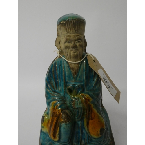 550 - A glazed Chinese pottery figure ornament, 8