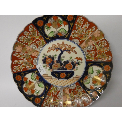 553 - A Japanese Imari charger 13