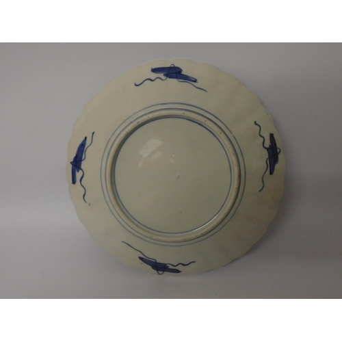 553 - A Japanese Imari charger 13