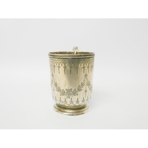 610 - A Victorian silver christening tankard, not monogrammed, London 1873, 9 cms tall, 4.35 troy oz.