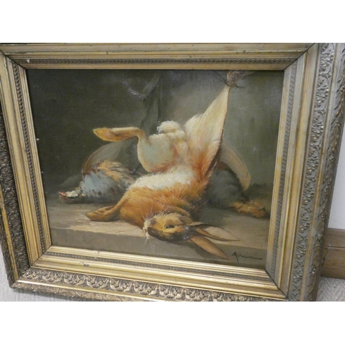 723 - A 19th century gilt framed oil on canvas of dead game, hare and a partridge, indistinctly signed, 14... 