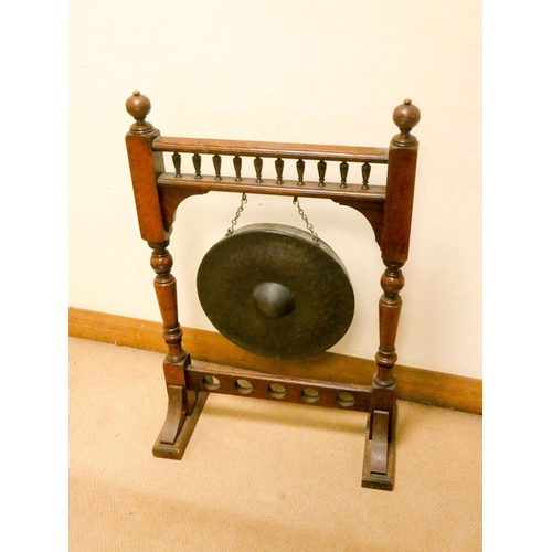 742 - An Edwardian brass gong on oak stand