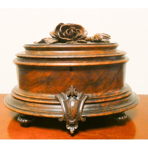 764 - Victorian walnut oval trinket box with carved rose handle to the lid, 10