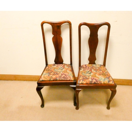 775 - A set of six mahogany high backed dining room chairs standing on cabriole style front legs with upho... 