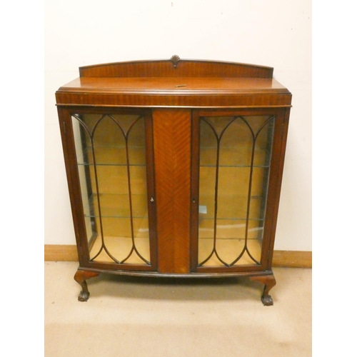 797 - A 1950's mahogany bow front china display cabinet standing on claw and ball feet, 3'6 wide