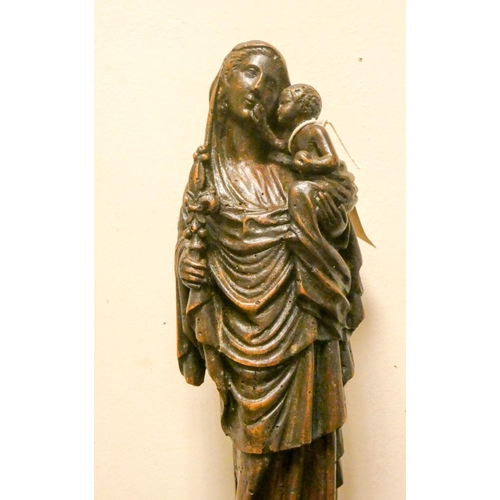 815 - An antique carved wood figure of Madonna and child, 12