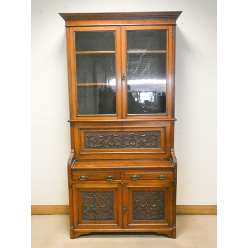 822 - An Edwardian walnut secretaire bookcase with glazed cabinet back, well fitted interior, drawers and ... 