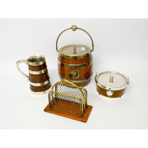 868 - An oak and plated biscuit barrel, oak and plated tankard, butter dish and a letter rack