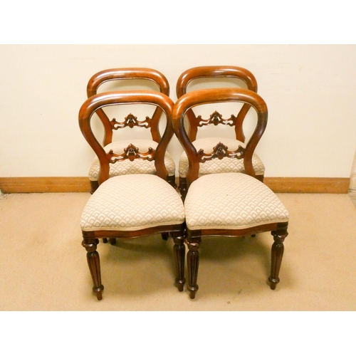 892 - A set of four Victorian style mahogany dining room chairs on reeded legs with upholstered seats