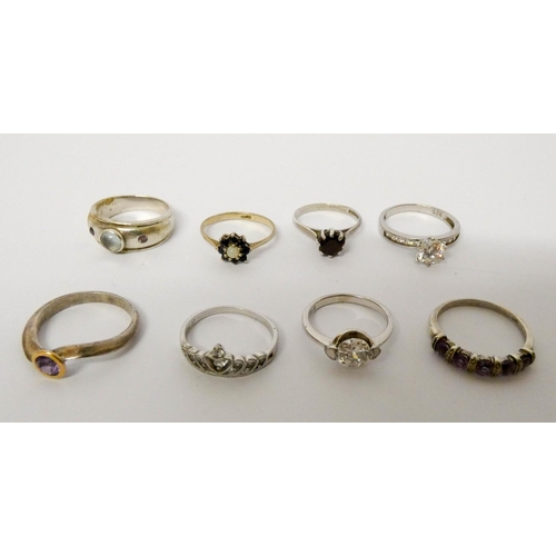 662 - A collection of ladies silver dress rings set various stones.