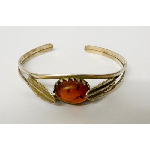 674 - A collection of silver and amber jewellery