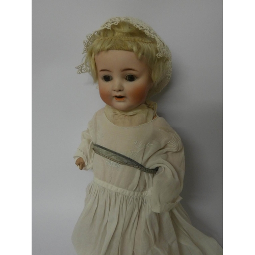 534 - An Alt Beck and Gottschalck bisque headed doll with blinking eyes and cry sound