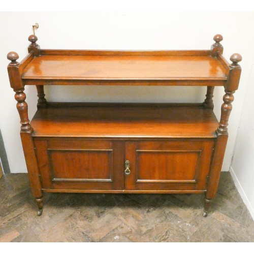 911 - A Victorian mahogany tray topped dumb waiter with cupboards under, 4' wide