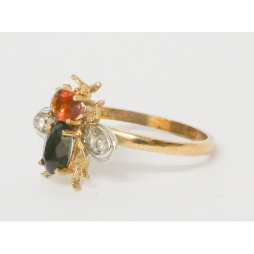 642 - Victorian design bee dress ring, the head of citrine, with sapphire body and diamond set wings, on 9... 