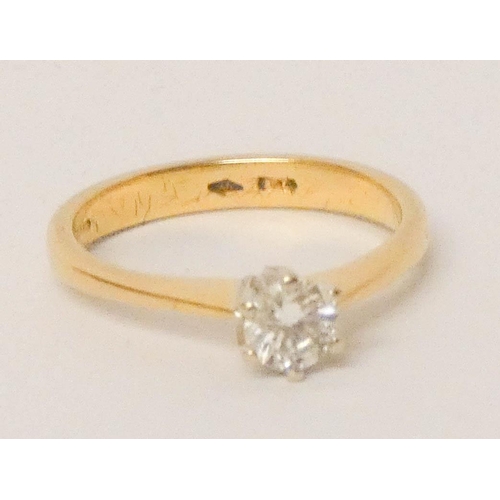 685 - A solitaire diamond ring, set with a circular brilliant cut diamond weighing approximately 0.4 carat... 