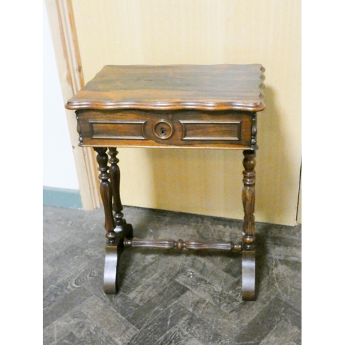 913 - Victorian rosewood lift top work table on reeded legs with stretcher, 21