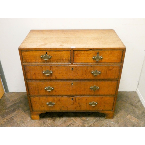 917 - A Georgian oak chest of three long and two short drawers with brass handles, 3' wide