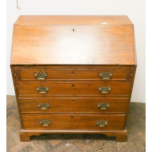 914 - A Georgian mahogany bureau with four long drawers under standing on bracket feet , 3' wide