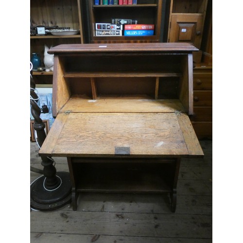 60 - A students oak bureau fitted drawer and shelves under 2'6 wide