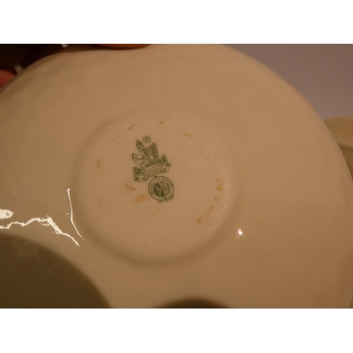 545 - Belleek shamrock decorated tea ware, comprising of four cups, four saucers, cream jug and sugar bowl... 