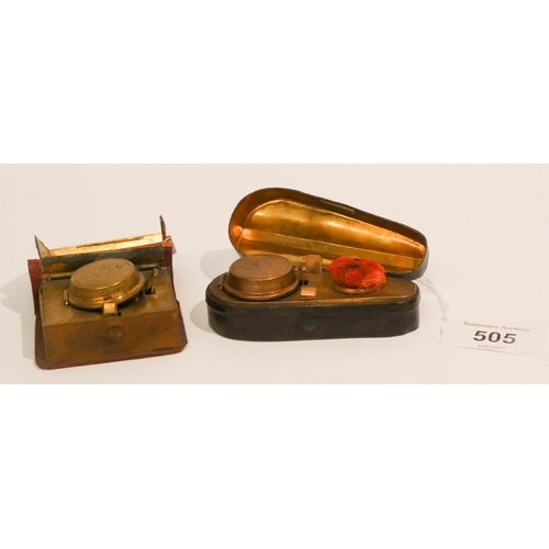 505 - A late 19th century novelty inkwell in the shape of a violin case and another modelled as a Post Off... 