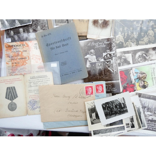 526 - A large collection of ephemera to include postcards, greetings cards, stamps, first day covers, offi... 