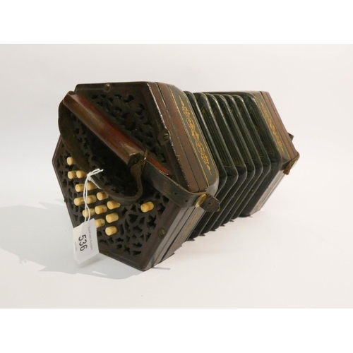 536 - A Victorian concertina with 29 stops and mahogany carrying case