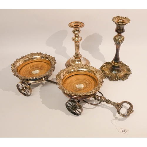 537 - A silver plated wagon double coaster and two plated candlesticks