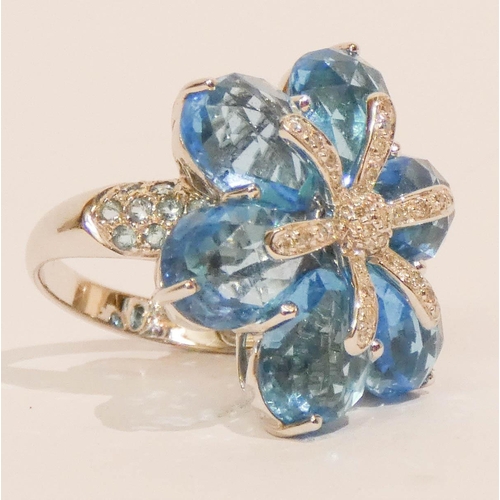 651 - Modern 18ct white gold statement blue topaz and diamond cluster ring- formed as flower head with dia... 