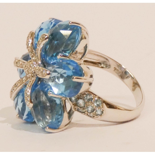 651 - Modern 18ct white gold statement blue topaz and diamond cluster ring- formed as flower head with dia... 