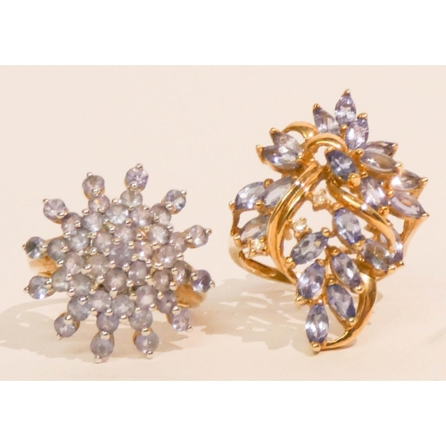 659 - Two modern ladies pale tanzanite cluster dress rings, both set in 9ct yellow gold, both size P