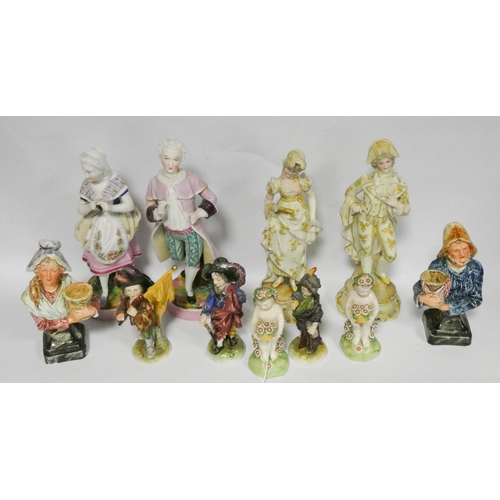 551 - Four continental bisque ware figure ornaments and seven others