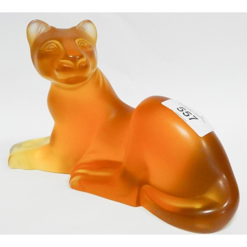 557 - A Lalique amber glass lioness ornament, 9 1/2