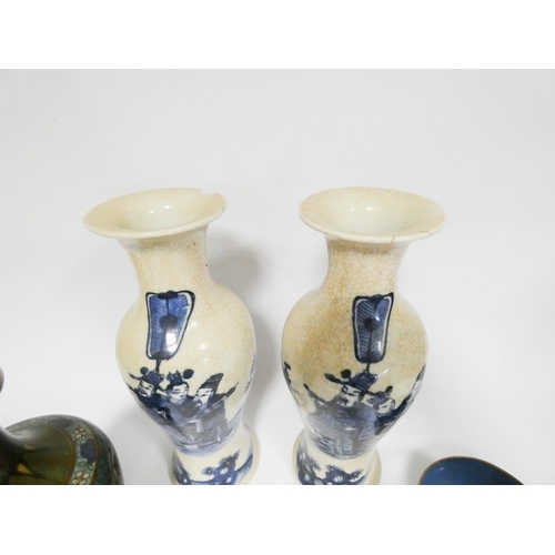 561 - A pair of Chinese figure decorated crackle ware vases, both rims chipped, each 11 1/2