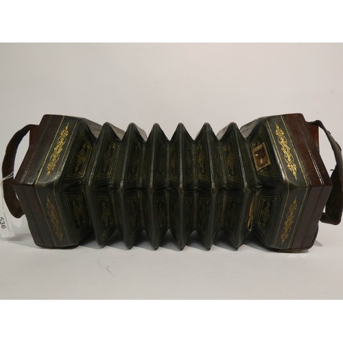 536 - A Victorian concertina with 29 stops and mahogany carrying case