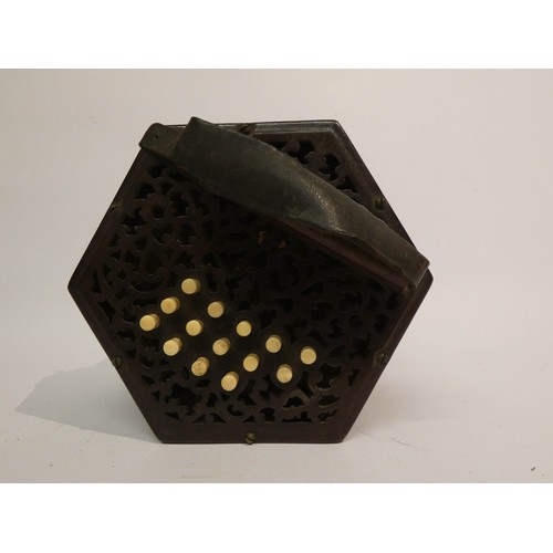 536 - A Victorian concertina with 29 stops and mahogany carrying case