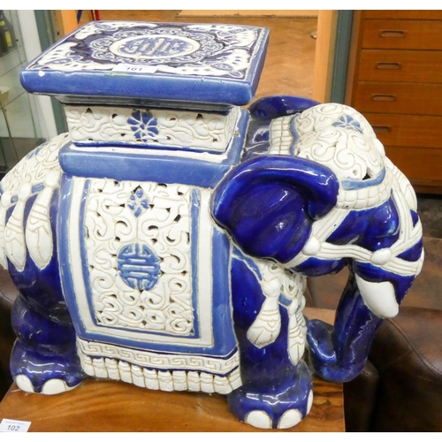 101 - A large blue and white china elephant seat ornament