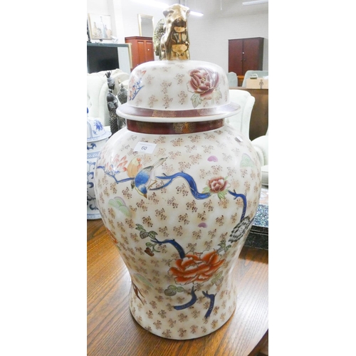 60 - A large Chinese bird and flower decorated jar with cover, 24