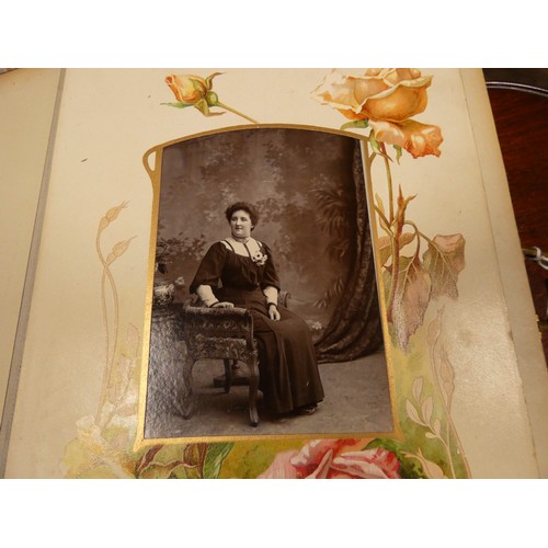 529 - An old leather bound Victorian photograph album together with a 1953 Coronation coach in its origina... 