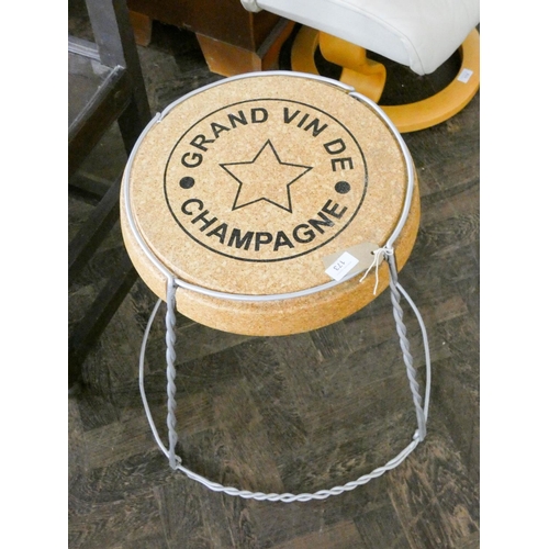 173 - A metal framed champagne cork stool