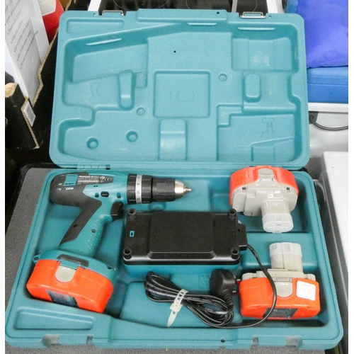 460 - A Makita 18v cordless drill and charger, plus 2 spares