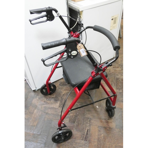 A four wheel zimmer frame with brakes, seat etc